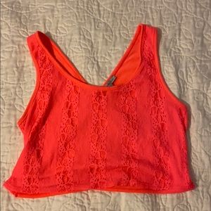 Neon salmon crop too with a cross back.